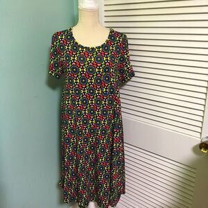 (5 for $25.)… Lularoe Carly floral short sleeves scoop neck versatile dress
